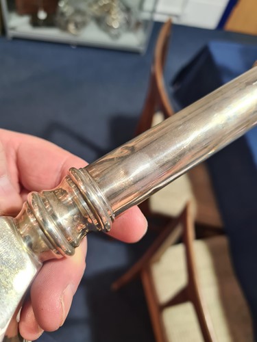 Lot 747 - A set of four sterling silver table...