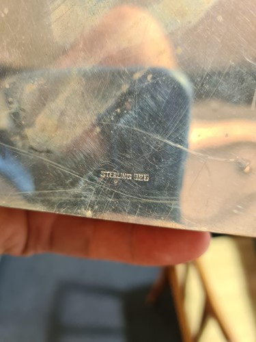 Lot 747 - A set of four sterling silver table...