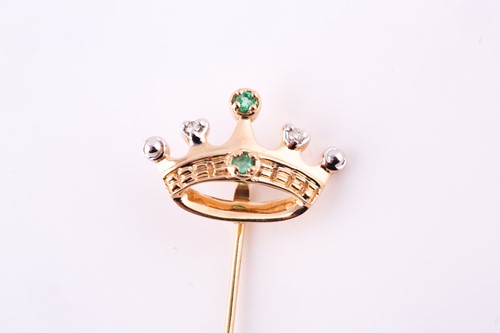Lot 386 - A crown tie pin, set with diamonds and...