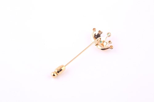Lot 386 - A crown tie pin, set with diamonds and...