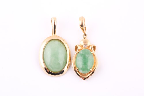 Lot 368 - Two Jadeite cabochon pendants, one with a...