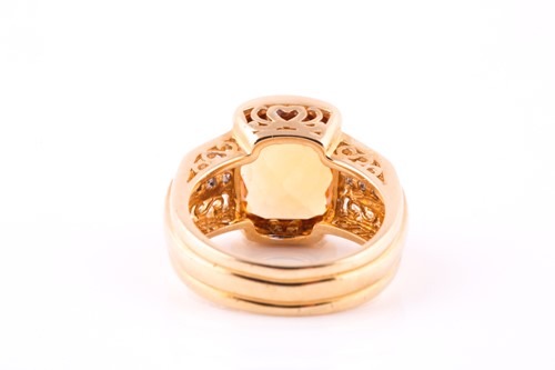 Lot 448 - A citrine and diamond dress ring, the cushion...