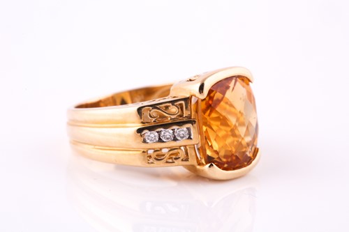 Lot 448 - A citrine and diamond dress ring, the cushion...