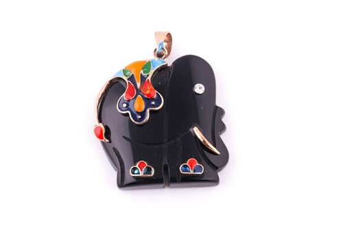 Lot 569 - Novelty elephant pendant, in black plastic...