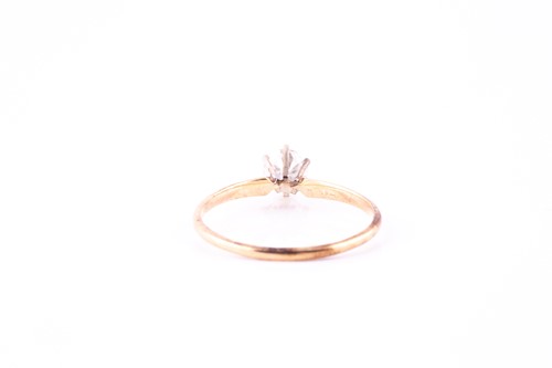 Lot 11 - A single-stone diamond ring, the round...