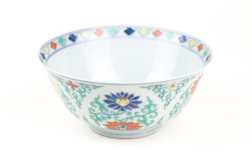 Lot 134 - A Chinese Doucai bowl, painted with blue, red...