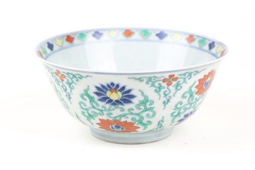 Lot 134 - A Chinese Doucai bowl, painted with blue, red...