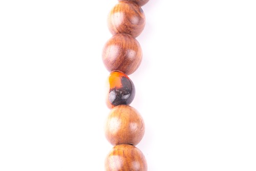 Lot 280 - A long Chanel necklace, the turned wooden...