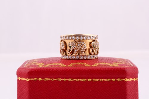 Lot 232 - A Cartier 'Elephant' ring, the wide band...