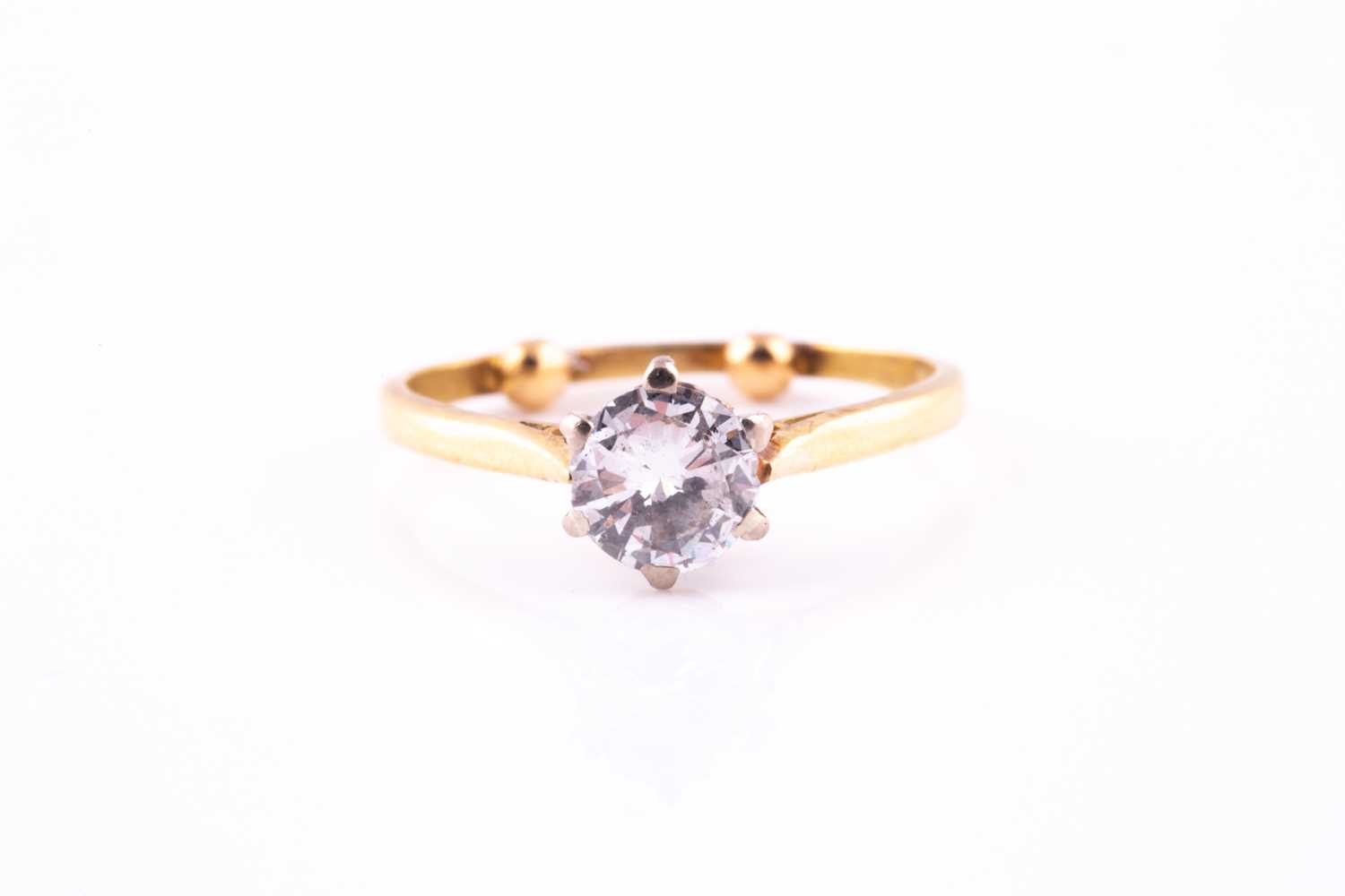 Lot 99 - A single-stone diamond ring, the round...