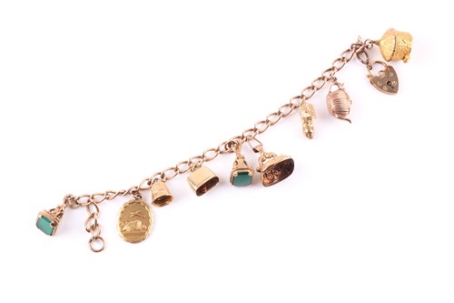Lot 159 - A 9ct gold charm bracelet with charms,...