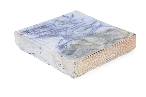 Lot 528 - A Martin Brothers stoneware blue-glazed tile,...