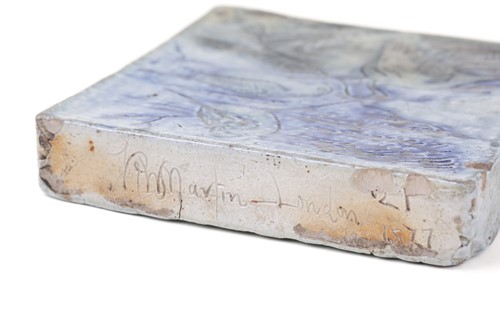 Lot 528 - A Martin Brothers stoneware blue-glazed tile,...