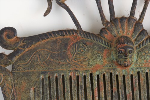 Lot 480 - A Roman-style verdigris bronze hair comb with...