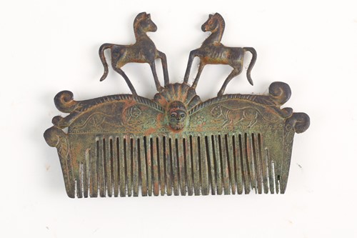 Lot 480 - A Roman-style verdigris bronze hair comb with...