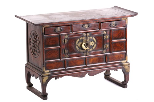 Lot 309 - A Chinese elm low cabinet, the first half of...