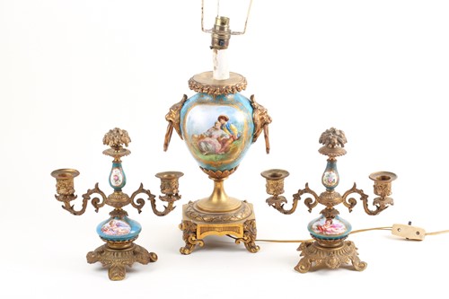 Lot 466 - A 19th-century French gilt metal and porcelain...