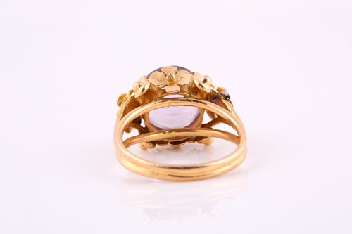 Lot 131 - A French amethyst dress ring, the yellow metal...