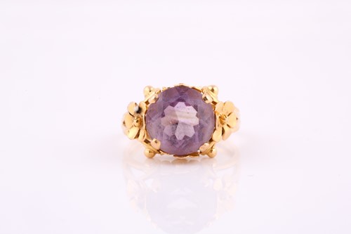 Lot 131 - A French amethyst dress ring, the yellow metal...