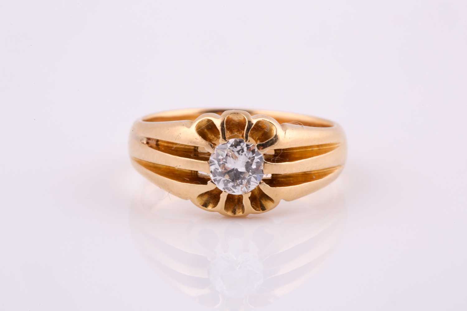 Lot 264 - An Edwardian single stone diamond ring, the...
