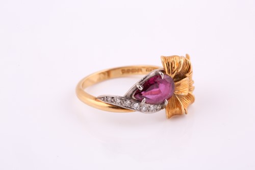 Lot 17 - An 18 carat yellow and white gold ruby and...
