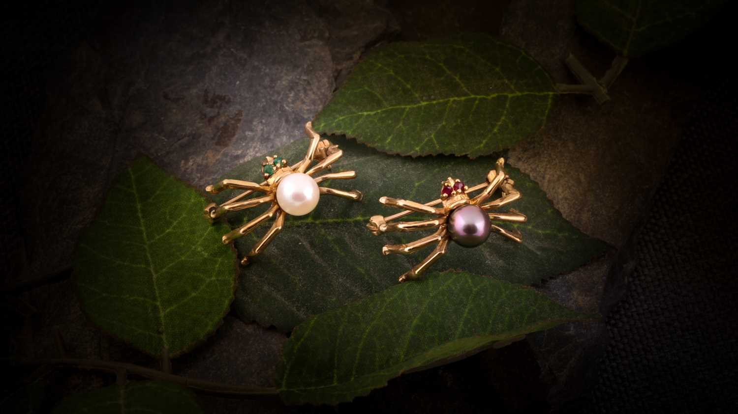 Lot 84 - A pair of pearl spider brooches, the first...