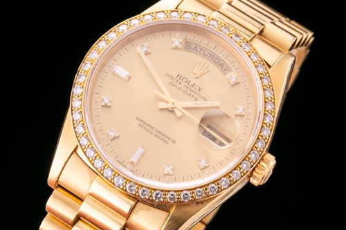 Lot 552 - A 36mm Rolex Day-Date in 18ct yellow gold with...