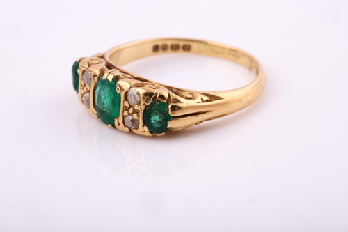 Lot 246 - An 18ct yellow gold Edwardian ring set with...