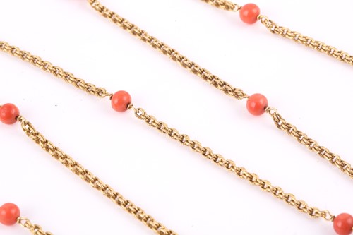 Lot 245 - A yellow precious metal and coral bead...