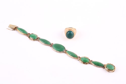 Lot 163 - A jade bracelet, with oval and navette shape...
