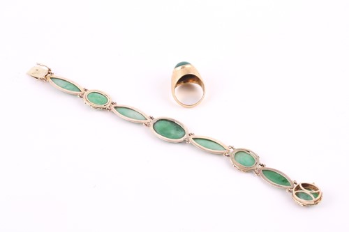 Lot 163 - A jade bracelet, with oval and navette shape...
