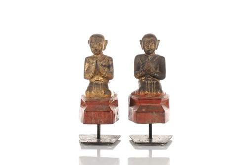 Lot 105 - A pair of Burmese carved painted and gilt...