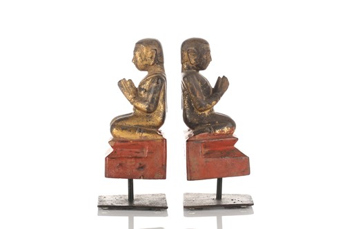 Lot 105 - A pair of Burmese carved painted and gilt...