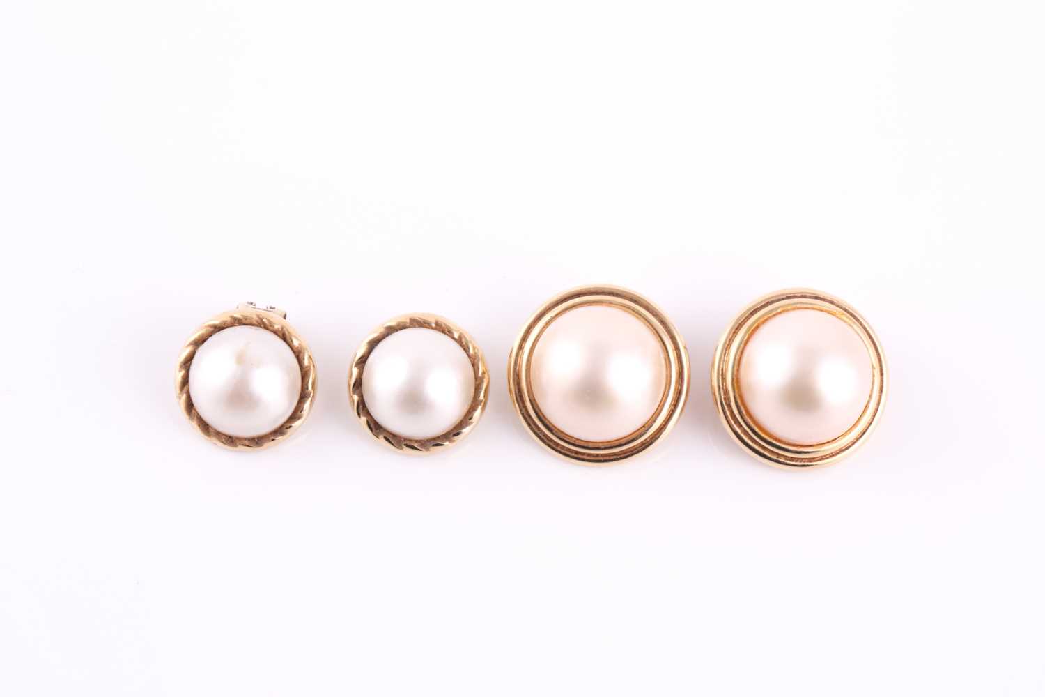 Lot 150 - Two sets of mabe pearl earrings, the first set...