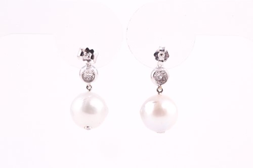 Lot 298 - A pair of diamond and pearl drop earrings, set...