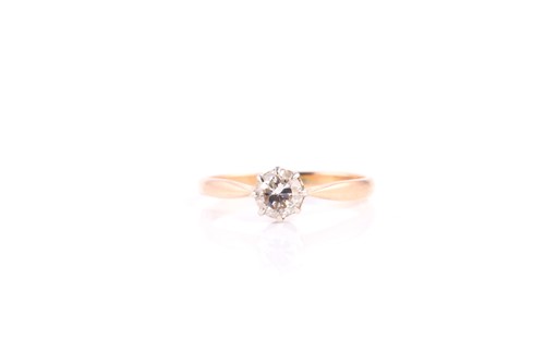 Lot 115 - A single stone diamond ring; the round...