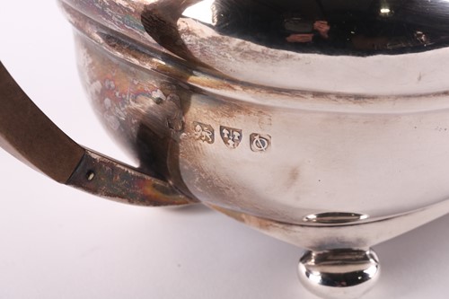 Lot 332 - A silver teapot; Chester 1942, maker's mark...