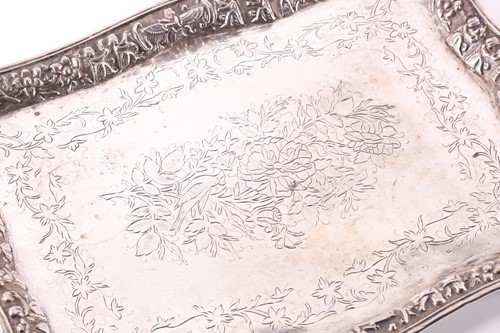 Lot 342 - A middle Eastern white metal tray; rounded...