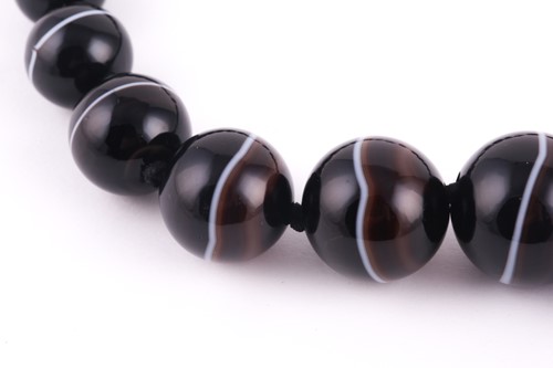 Lot 178 - An antique graduated banded agate bead...