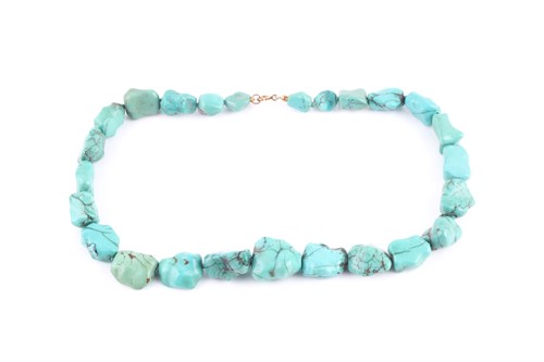 Lot 108 - A 1920s Chinese turquose necklace, set with 25...