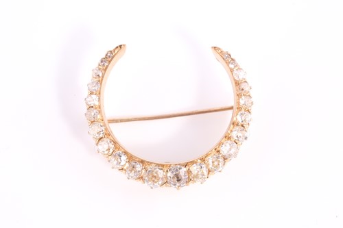 Lot 186 - A 19th-century diamond crescent brooch, set...