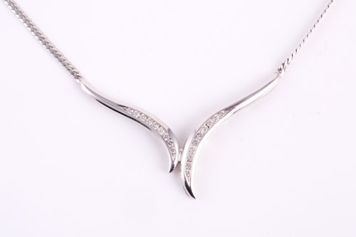Lot 100 - A 9ct white gold and diamond necklace, channel...