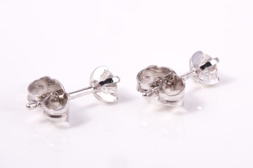 Lot 121 - A pair of platinum diamond studs earrings, 4...