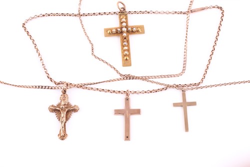 Lot 46 - A collection of three 9ct gold crosses,...