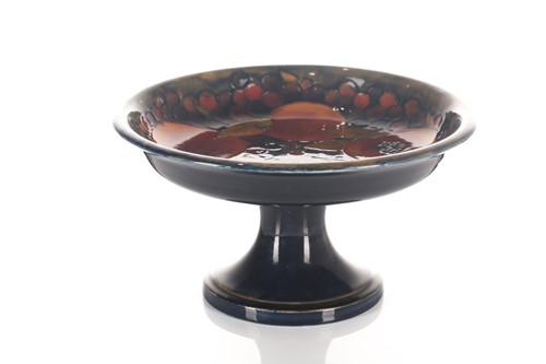 Lot 511 - A Moorcroft tazza in the Pomegranate pattern,...