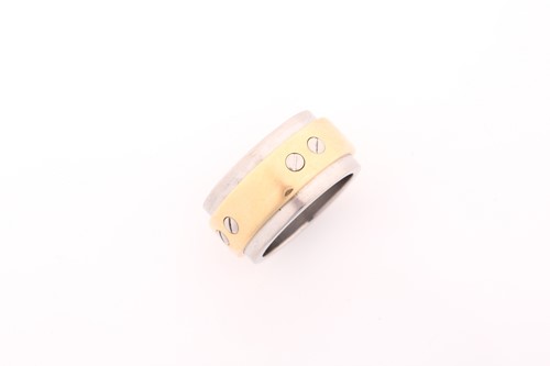 Lot 250 - Cartier. A Cartier Santos gold and steel ring;...