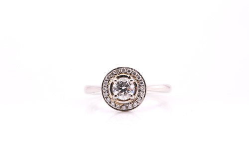 Lot 560 - A diamond cluster ring; the round brilliant...
