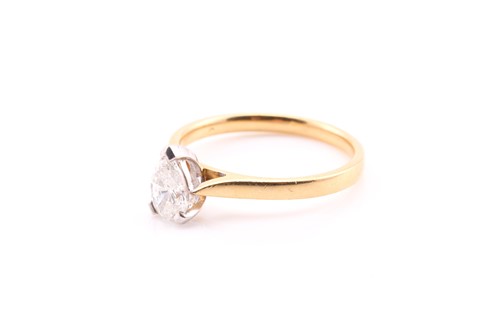 Lot 223 - A single stone diamond ring; the pear-shaped...