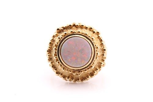 Lot 721 - A single stone opal cocktail ring, the...