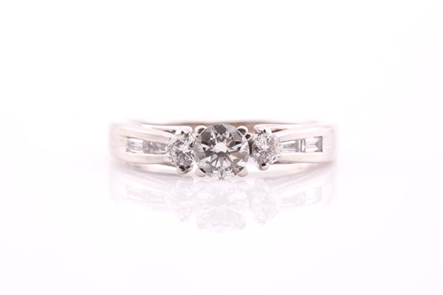 Lot 257 - An 18ct white gold and diamond three stone,...